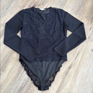 G F Intimate Sleek Black Bodysuit for Effortless Style Size M